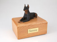 Black Doberman Dog Laying Figurine Urn